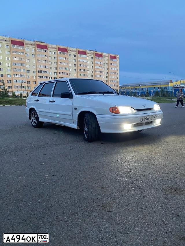 Фото автомобиля LADA 2114 SAMARA, 2012 — госномер А494ОК702. Цвет: Белый