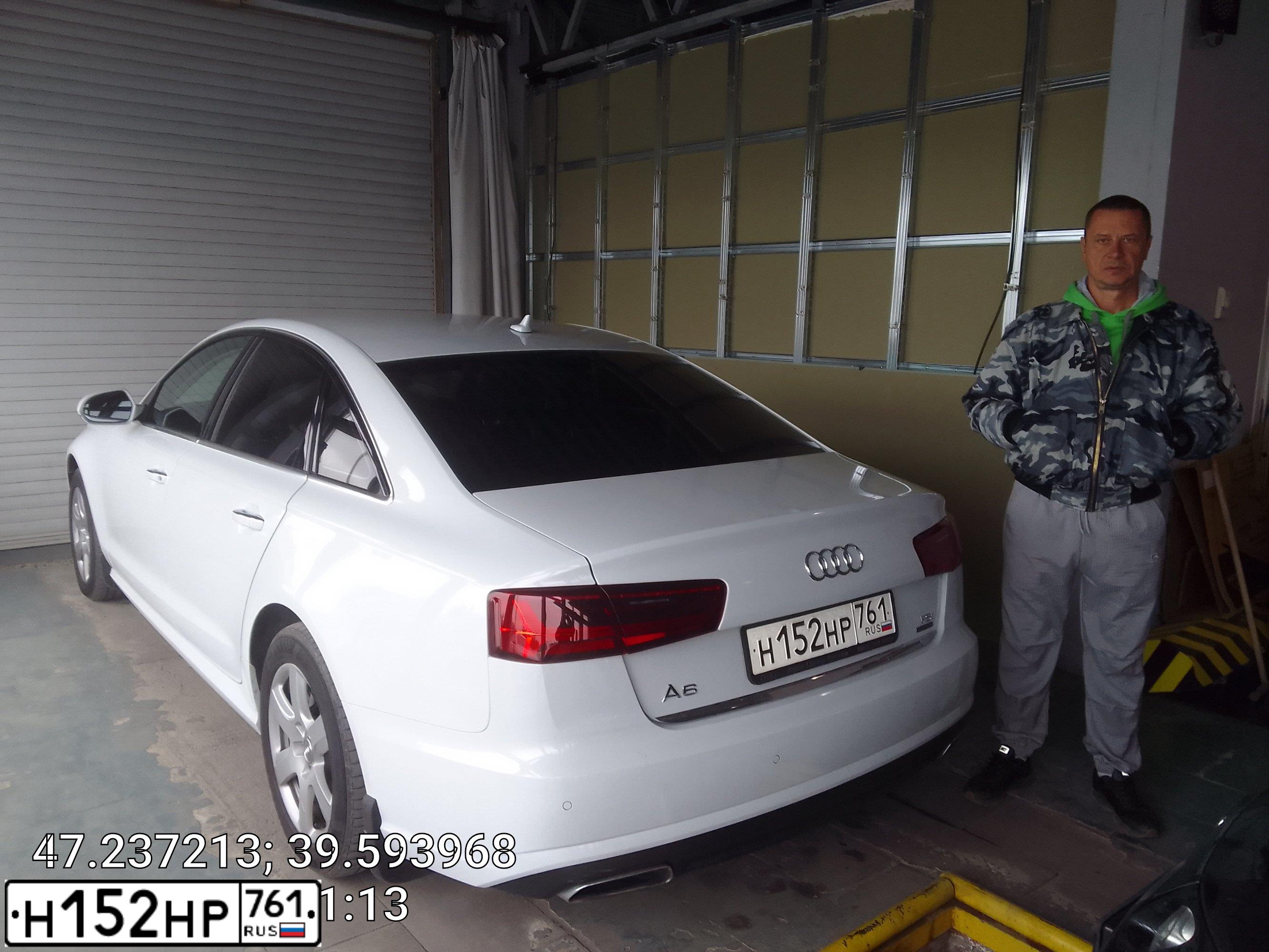 Фото автомобиля AUDI A6, 2015 — госномер Н152НР761. Цвет: Белый