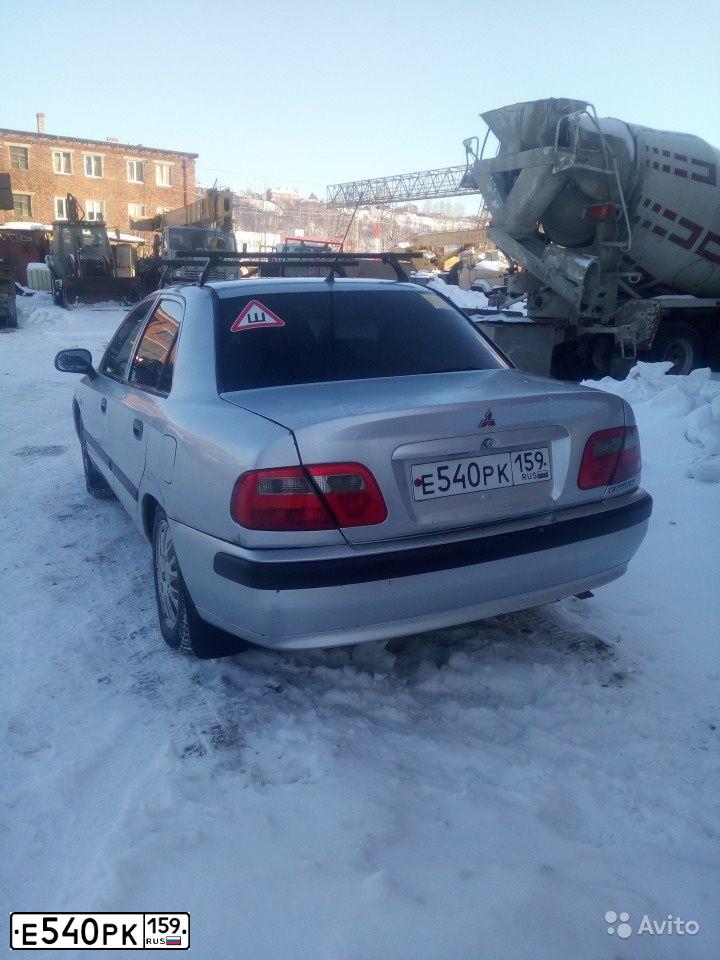 Фото автомобиля MITSUBISHI CARISMA, 1999 — госномер Е540РК159. Цвет: СЕРЕБРИСТЫЙ