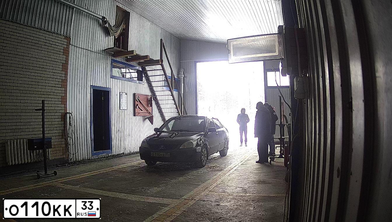 Фото автомобиля MITSUBISHI LANCER, 2006 — госномер О110КК33. Цвет: ЧЕРНЫЙ