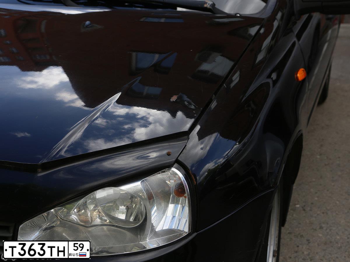 Фото автомобиля LADA 1119 KALINA, 2010 — госномер Р453ХР33. Цвет: ЧЕРНЫЙ