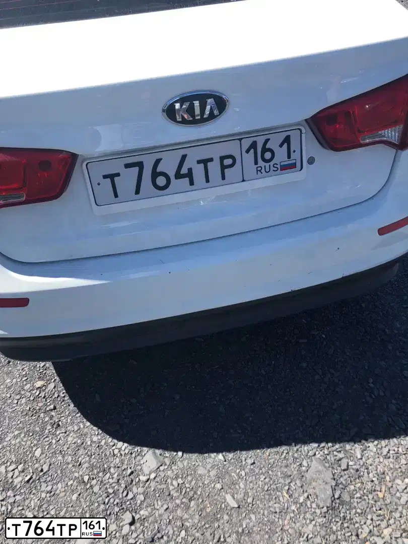 Фото автомобиля KIA RIO, 2016 — госномер Р223АР761. Цвет: Белый