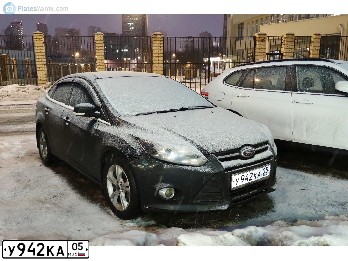 Фото автомобиля FORD FOCUS, 2012 — госномер А017МР05. Цвет: ЧЕРНЫЙ