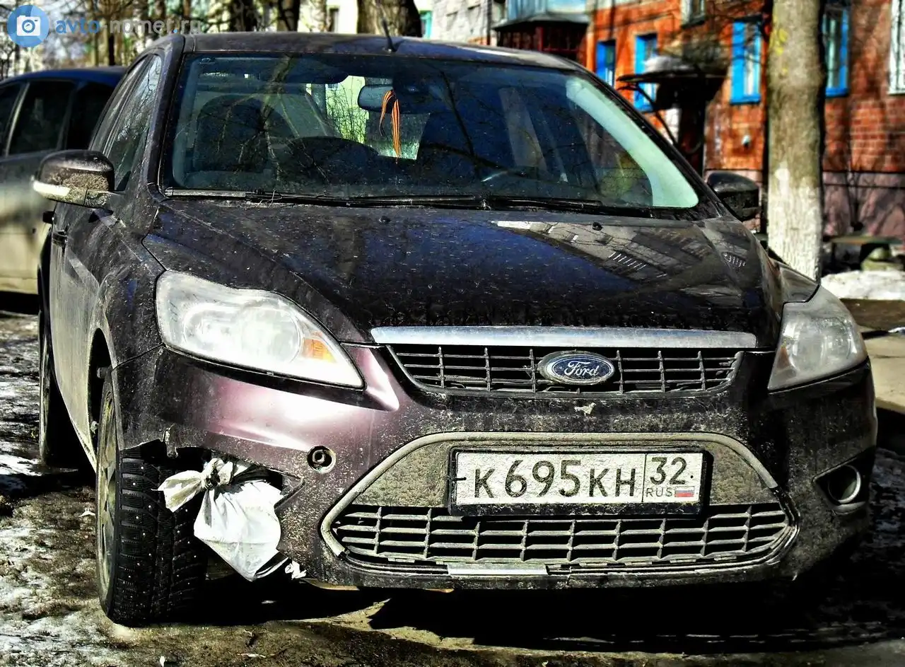 Фото автомобиля FORD FOCUS, 2008 — госномер К695КН32. Цвет: ФИОЛЕТОВЫЙ