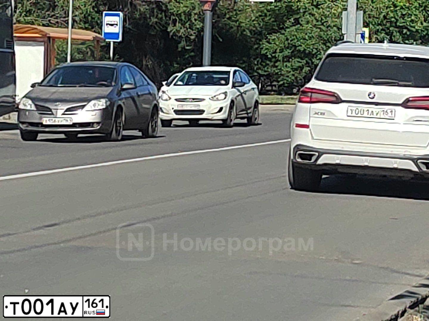 Фото автомобиля BMW БМВ X5, 2020 — госномер Т001АУ161. Цвет: БЕЛЫЙ