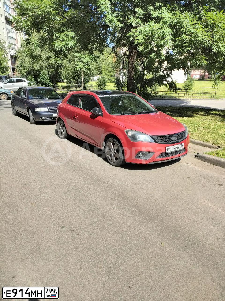Фото автомобиля KIA CEE'D, 2011 — госномер Е914МН799. Цвет: КРАСНЫЙ