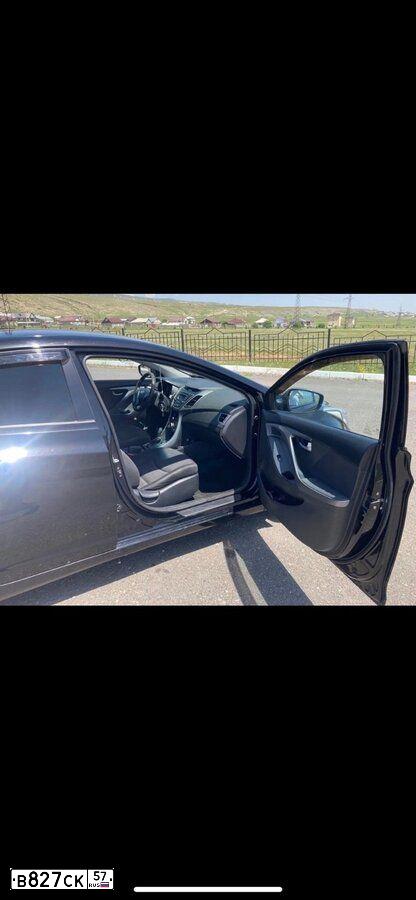 Фото автомобиля HYUNDAI ELANTRA, 2013 — госномер В827СК57. Цвет: ЧЕРНЫЙ
