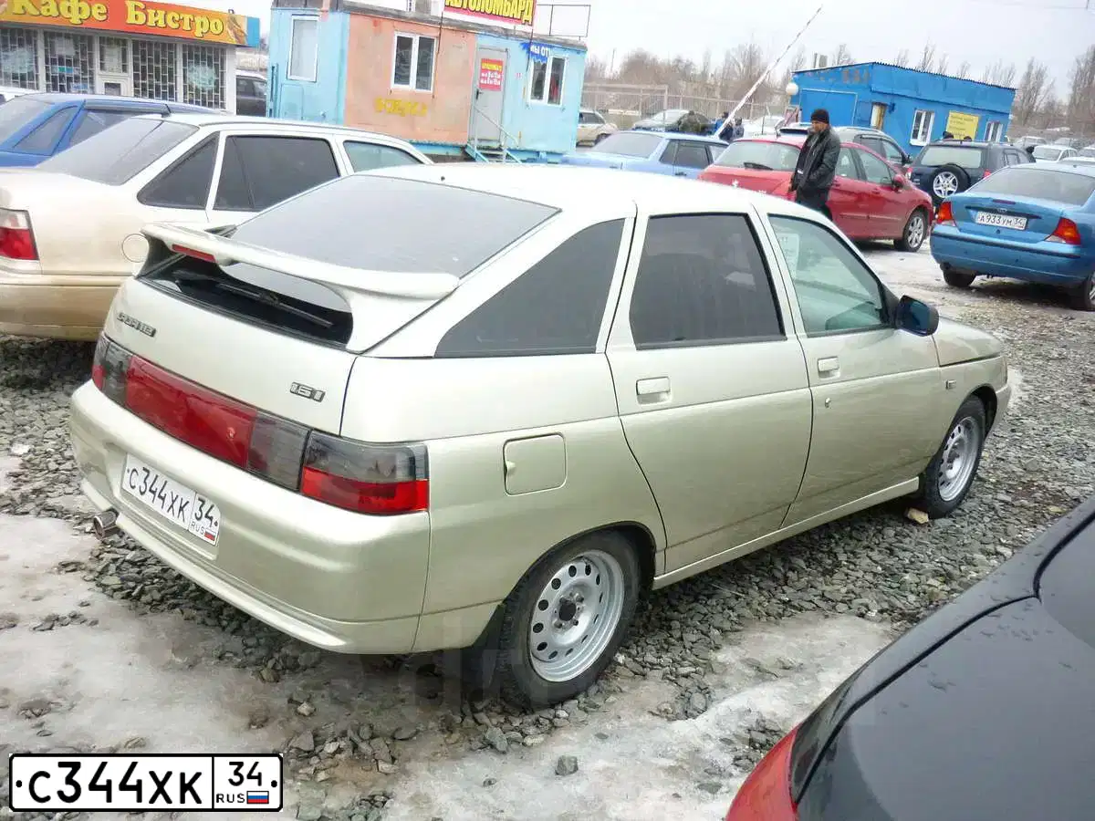 Фото автомобиля LADA 2112, 2006 — госномер С344ХК34. Цвет: СЕРЕБРИСТО БЕЖЕВЫЙ