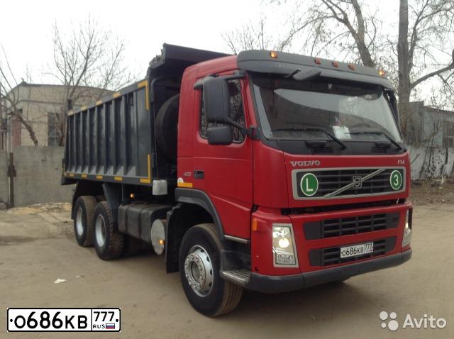 Фото автомобиля VOLVO SERIE FM /6X4/, 2007 — госномер Е341ОУ197. Цвет: СЕРЫЙ КАБИНА-КРАСНЫЙ