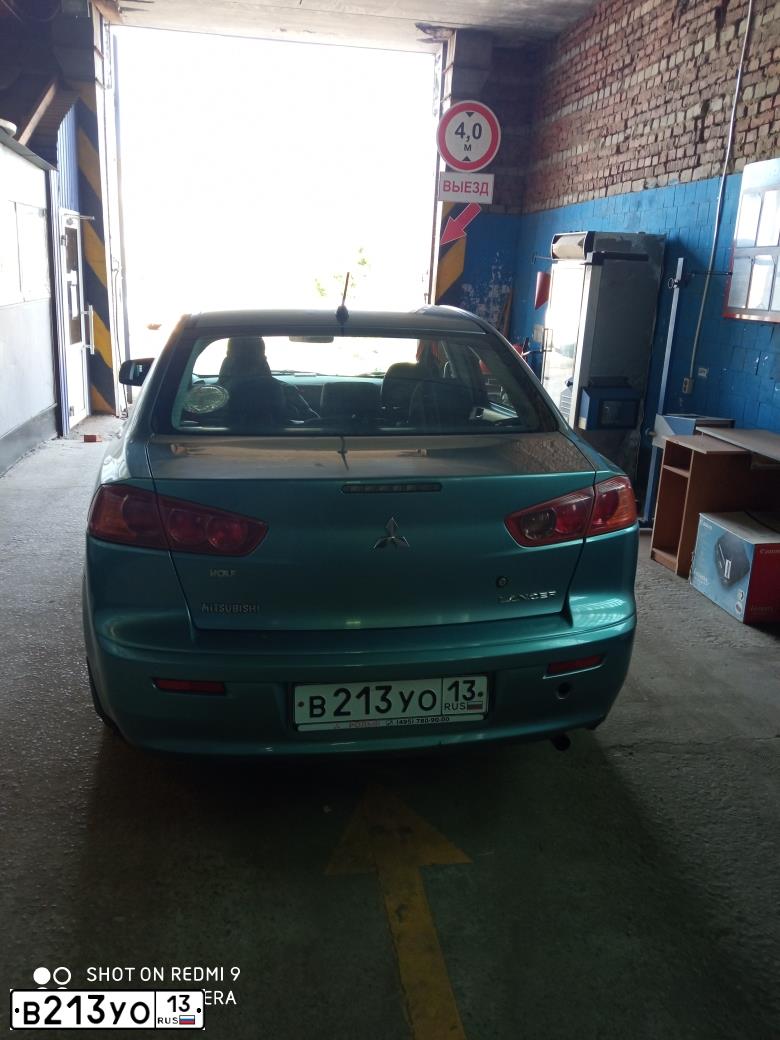 Фото автомобиля MITSUBISHI LANCER, 2008 — госномер М545ОТ164. Цвет: СВЕТЛО-СЕРО-ЗЕЛЕНЫЙ