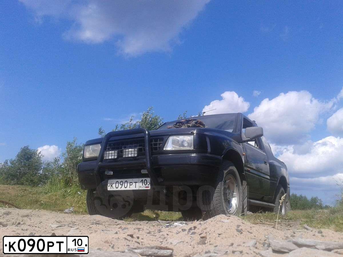 Фото автомобиля OPEL FRONTERA, 1993 — госномер С120СВ05. Цвет: ЧЕРНЫЙ