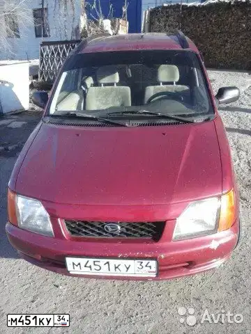 Фото автомобиля DAIHATSU GRAN MOVE, 1998 — госномер М451КУ34. Цвет: Красный(розовый)