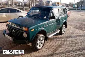 Фото автомобиля LADA 2121 NIVA, 2003 — госномер О158ЕМ48. Цвет: Сине-зеленый