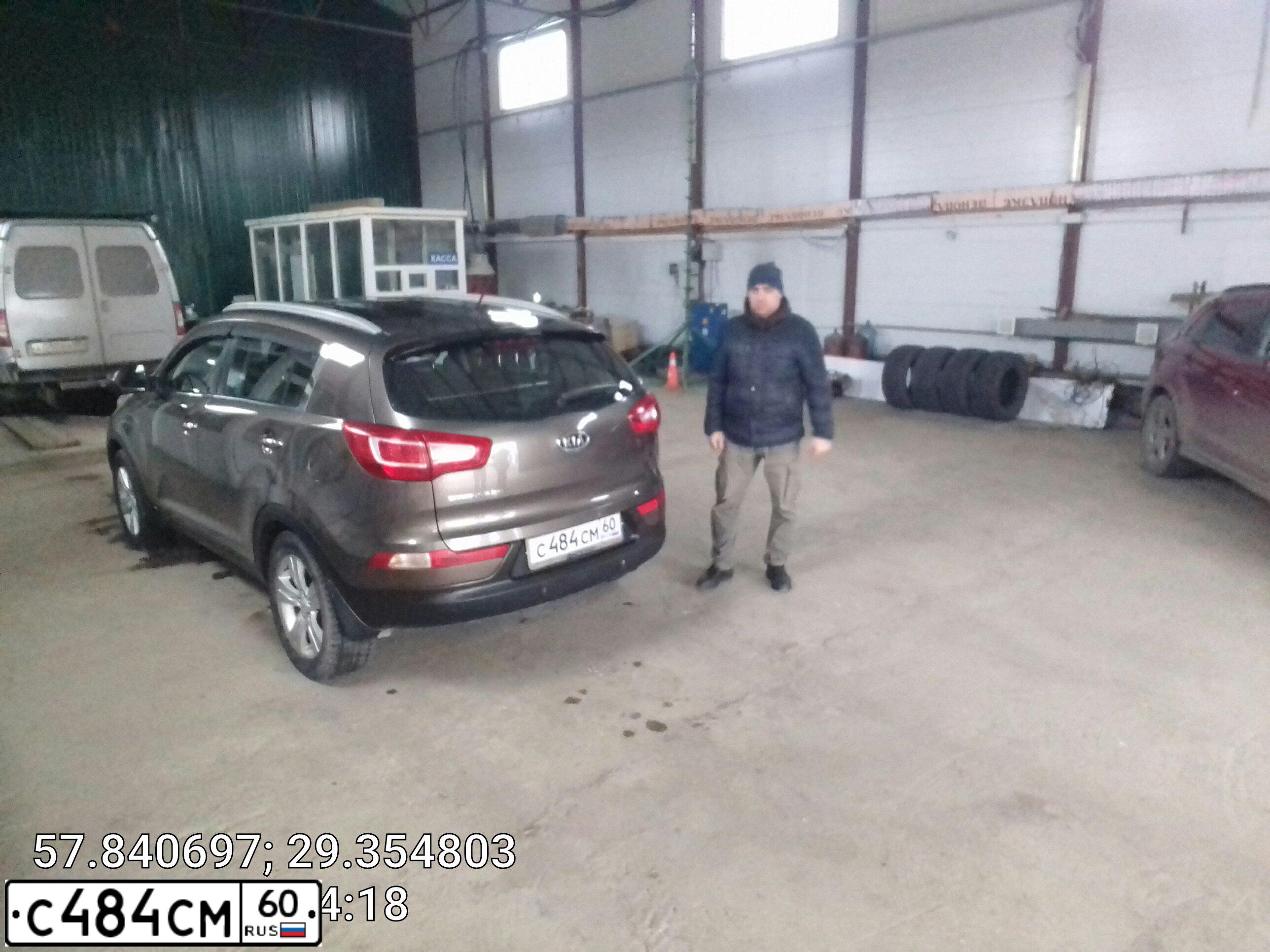 Фото автомобиля KIA SPORTAGE, 2010 — госномер А767КВ60. Цвет: Коричневый