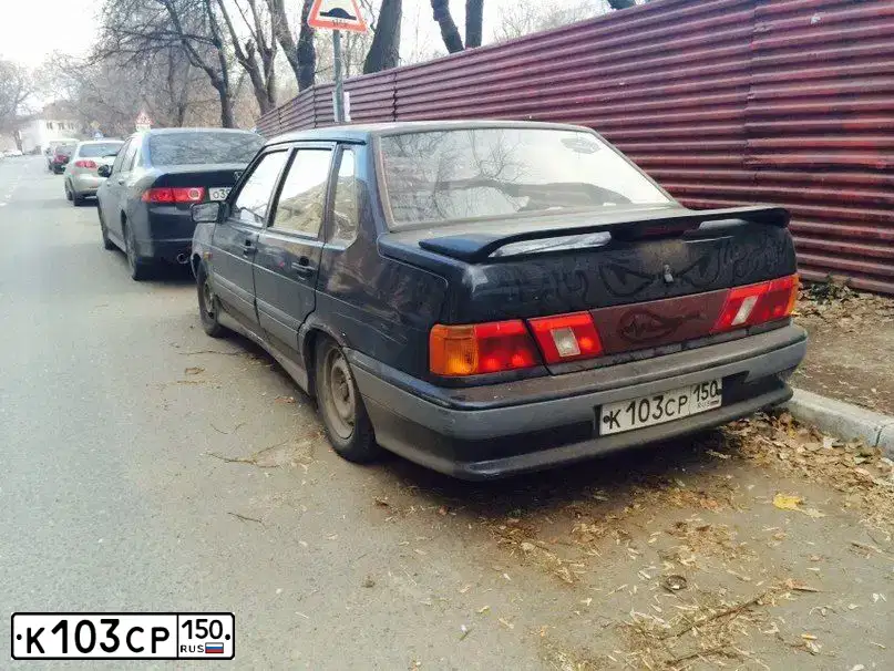Фото автомобиля LADA 2115 SAMARA, 2005 — госномер К103СР150. Цвет: ЧЕРНЫЙ