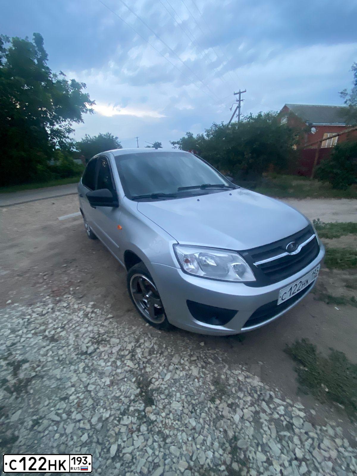 Фото автомобиля LADA 2191 GRANTA, 2014 — госномер Е001ХХ159. Цвет: Серебристый