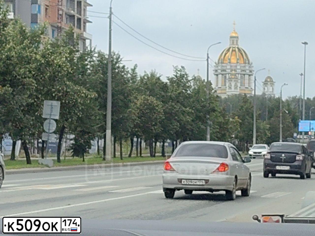 Фото автомобиля BMW SERIE 1, 2005 — госномер К499СА174. Цвет: ЧЕРНЫЙ