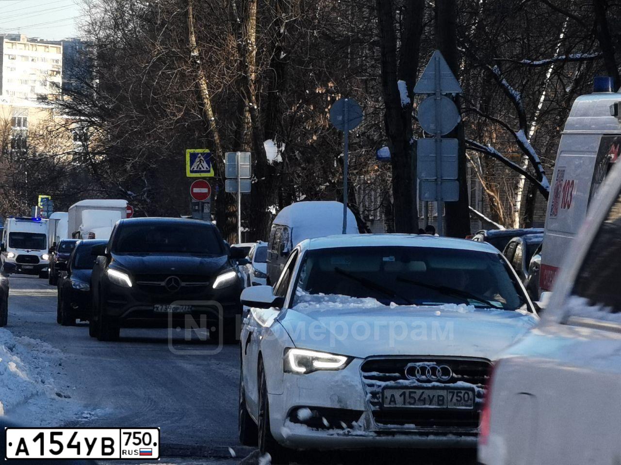 Фото автомобиля AUDI A5, 2012 — госномер А154УВ750. Цвет: Белый