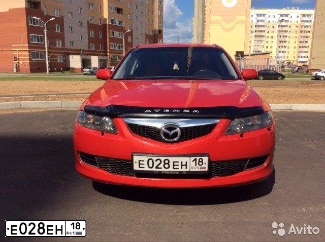 Фото автомобиля VOLKSWAGEN TIGUAN, 2010 — госномер Р725СТ18
