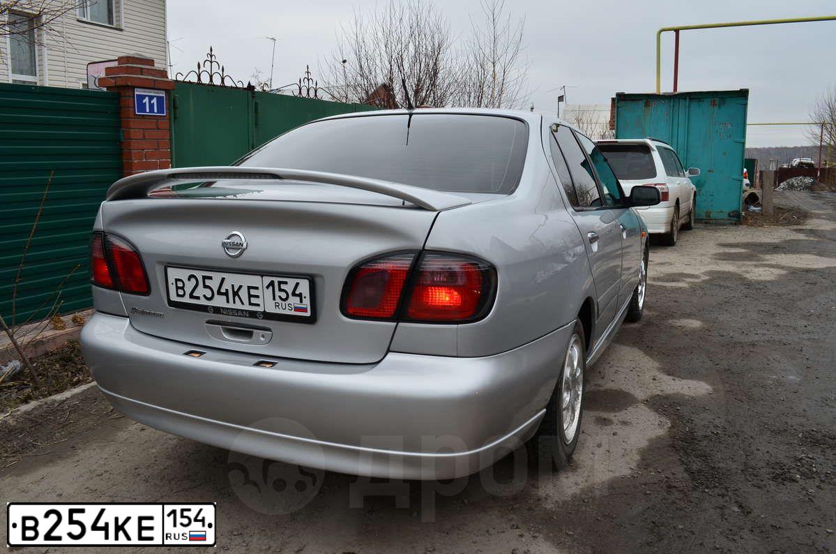 Фото автомобиля NISSAN PRIMERA, 2000 — госномер В254КЕ154. Цвет: серебристый