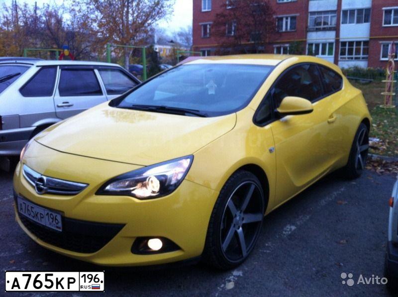 Фото автомобиля OPEL ASTRA, 2012 — госномер В984МН196. Цвет: ЖЕЛТЫЙ