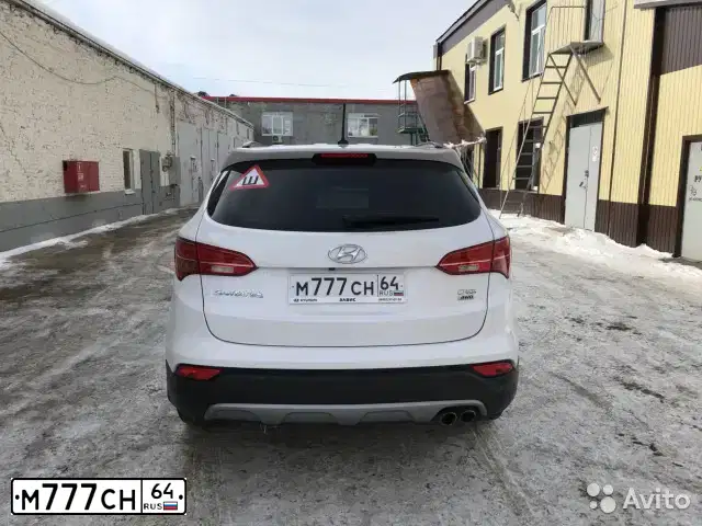 Фото автомобиля RENAULT SANDERO, 2013 — госномер Т155ЕК64. Цвет: Коричневый