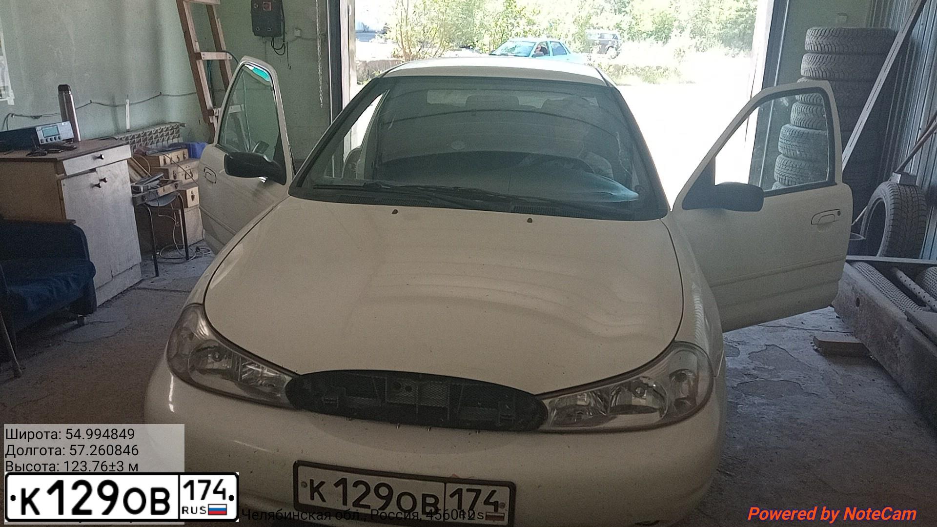 Фото автомобиля FORD CONTOUR, 2000 — госномер К129ОВ174. Цвет: БЕЛЫЙ