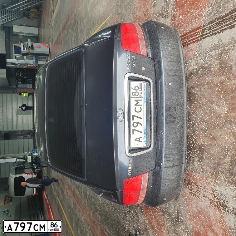 Фото автомобиля TAGAZ SONATA, 2005 — госномер В526МК01. Цвет: ЧЕРНЫЙ