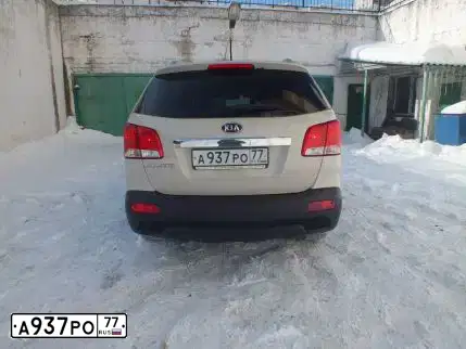 Фото автомобиля KIA SORENTO, 2009 — госномер В856СО750. Цвет: БЕЖЕВЫЙ