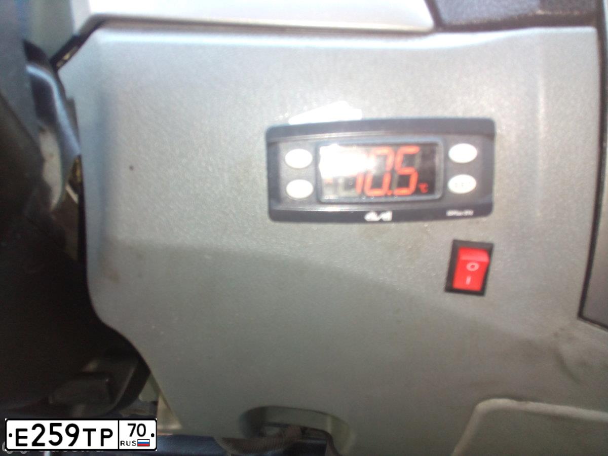 Фото автомобиля GAZ 3302 EL, 2013 — госномер Е259ТР70. Цвет: Белый