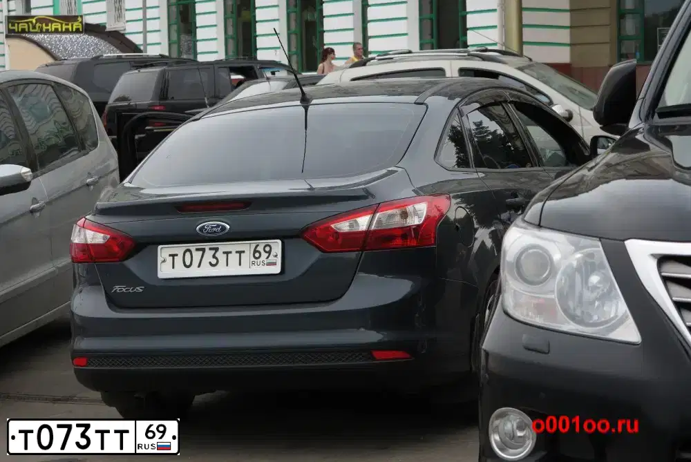 Фото автомобиля FОRD FОСUS, 2012 — госномер Т073ТТ69. Цвет: ТЕМНО-СЕРЫЙ