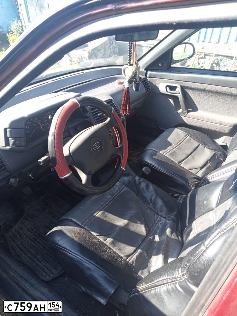 Фото автомобиля LADA 2110, 2005 — госномер С759АН154. Цвет: КРАСНЫЙ