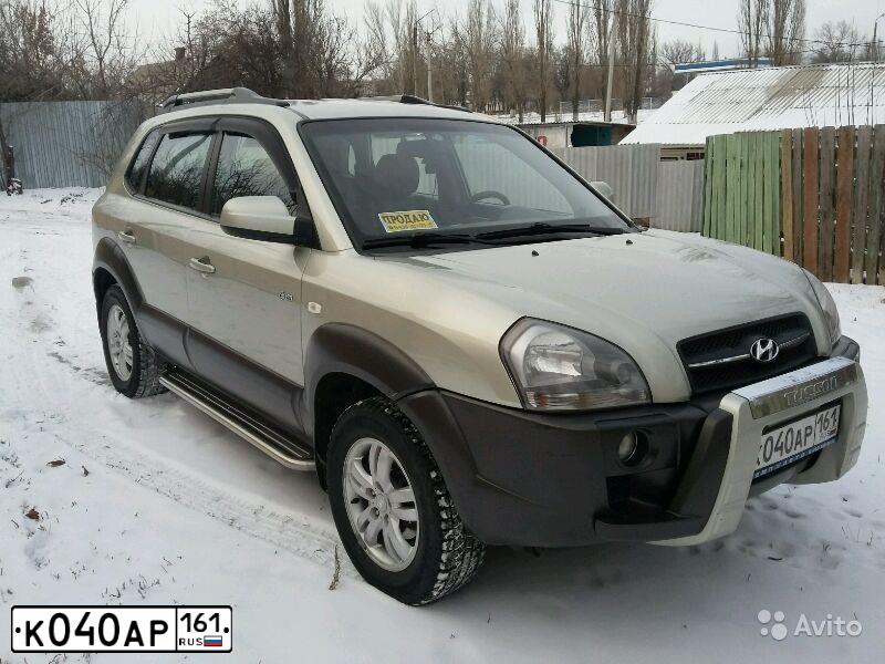 Фото автомобиля HYUNDAI TUCSON, 2005 — госномер К040АР161. Цвет: СВ СЕРЫЙ