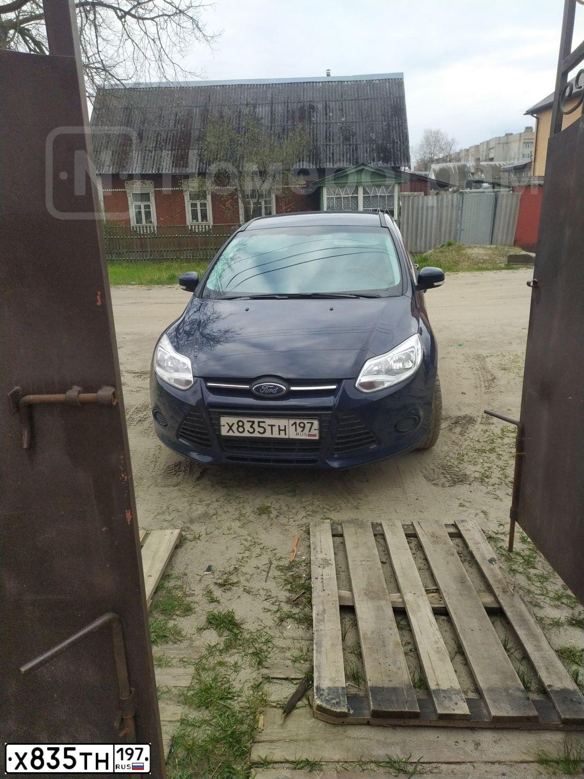 Фото автомобиля FORD FOCUS, 2012 — госномер О231КС32. Цвет: Темно-синий