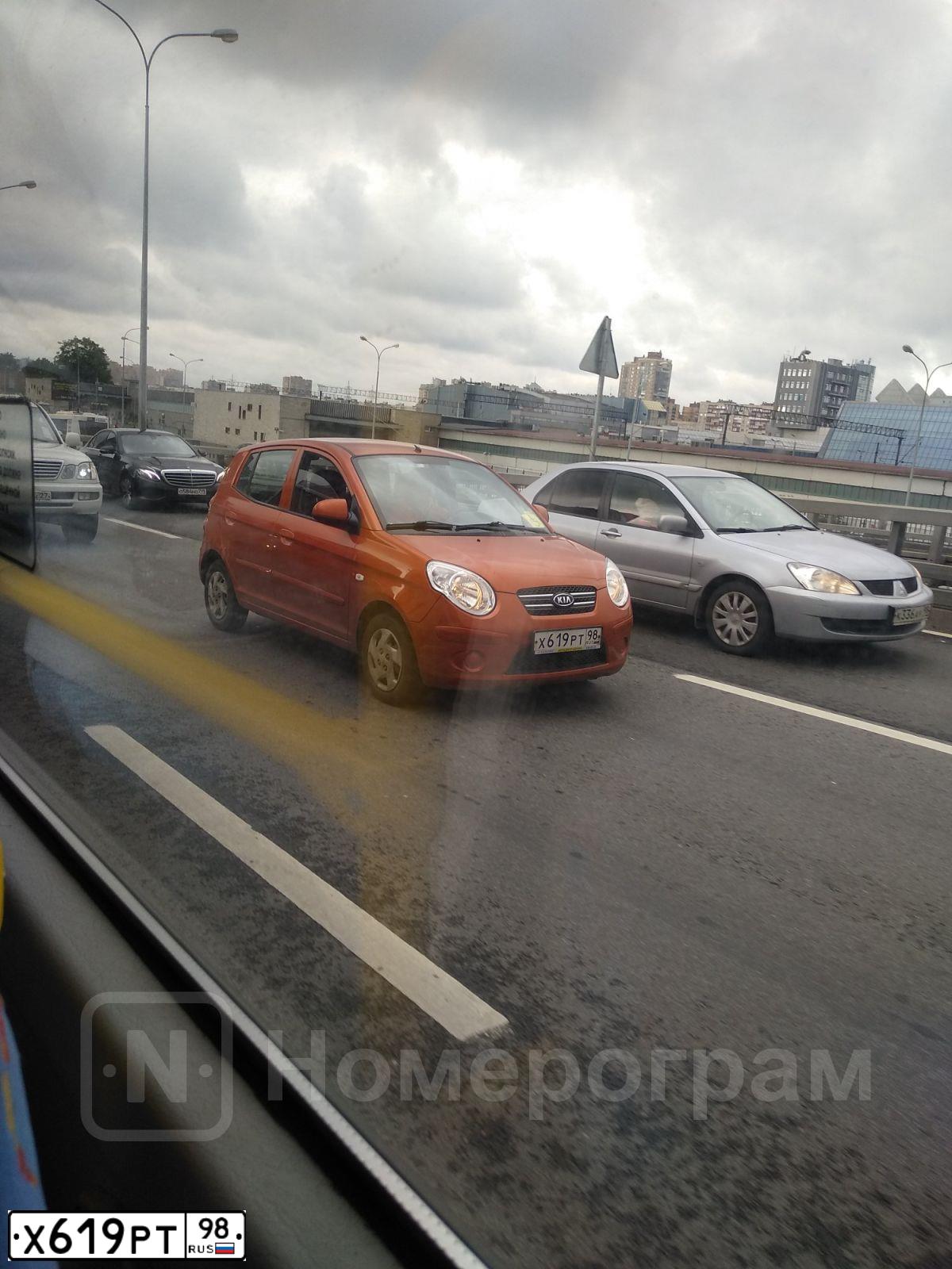 Фото автомобиля KIA PICANTO / MORNING, 2009 — госномер Х619РТ98. Цвет: Оранжевый
