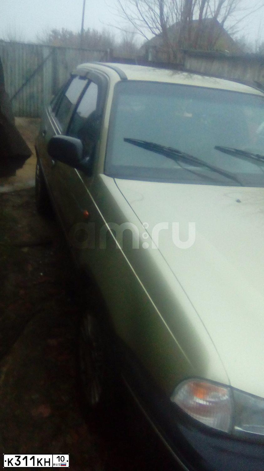 Фото автомобиля BMW SERIE 5, 1994 — госномер К311КН10. Цвет: СЕРЕБРИСТЫЙ