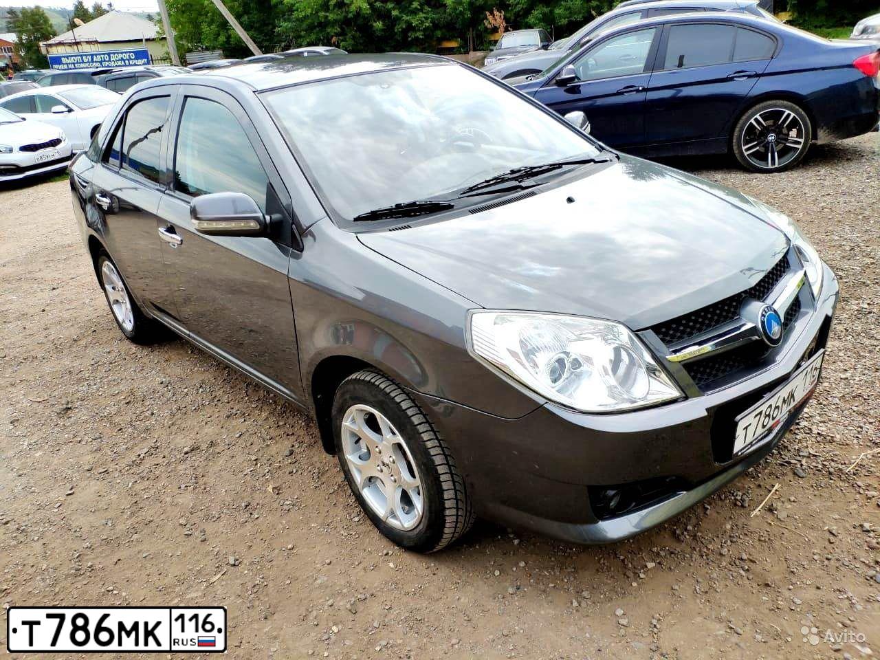 Фото автомобиля GEELY MK, 2014 — госномер Т585ХС18. Цвет: СТАЛЬНОЙ СЕРЫЙ