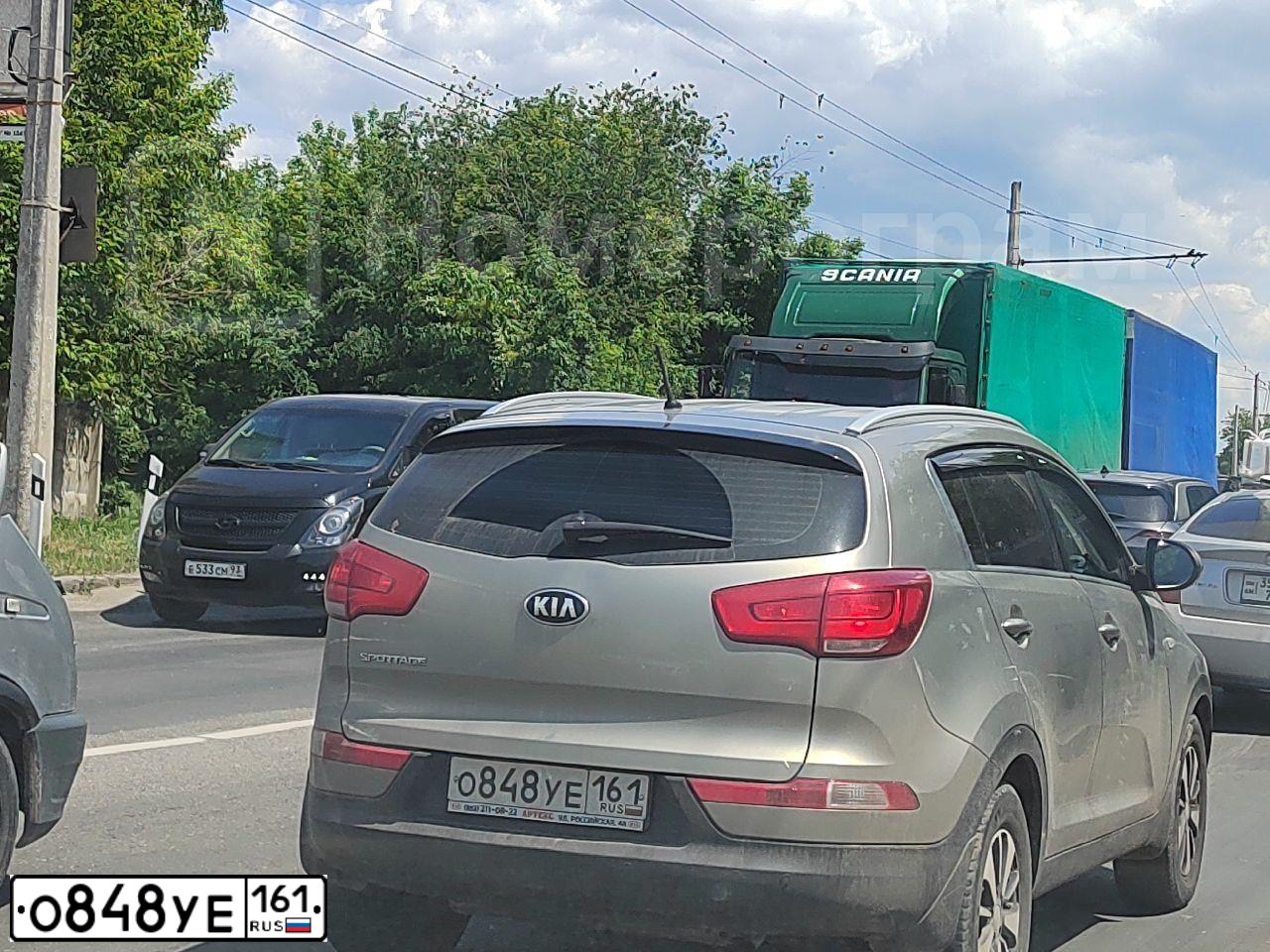 Фото автомобиля KIA SPORTAGE, 2015 — госномер О848УЕ161. Цвет: Серебристый