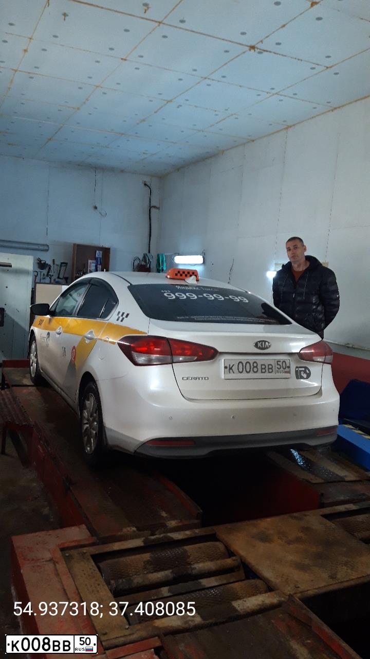 Фото автомобиля KIA RIO, 2015 — госномер Е200ХЕ750. Цвет: БЕЛЫЙ ЖЕЛТЫЙ СЕРЫЙ