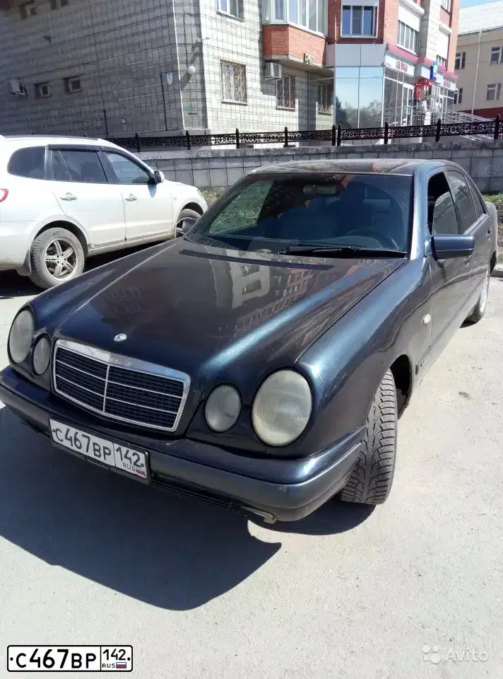 Фото автомобиля MERCEDES E-KLASSE, 1998 — госномер О907ТЕ44. Цвет: ТЕМНО СИНИЙ