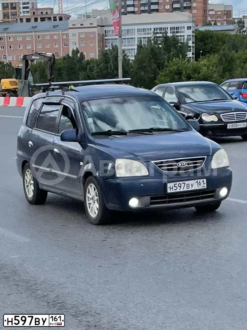 Фото автомобиля KIA CARENS, 2003 — госномер Х223МТ142. Цвет: синий