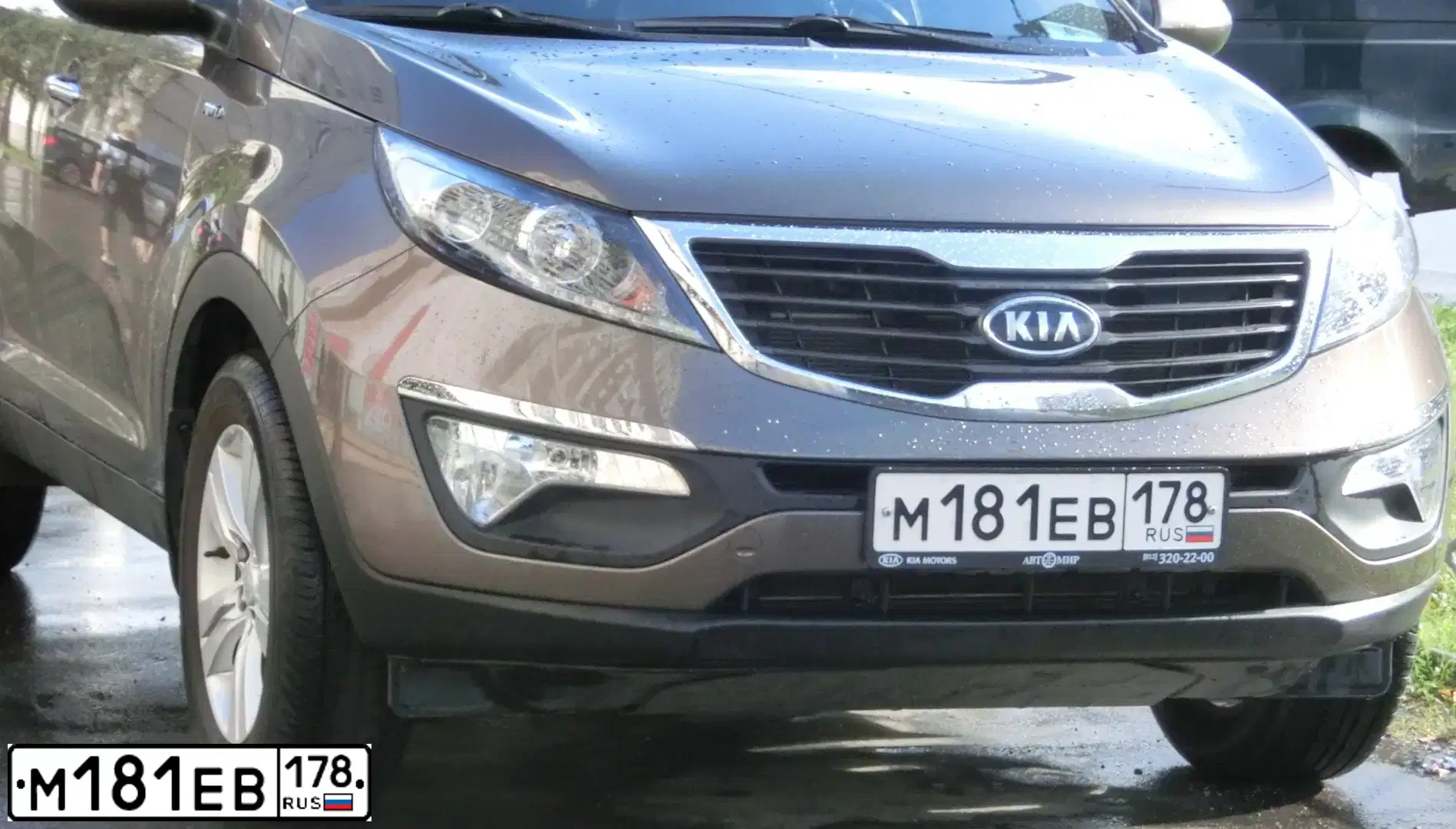 Фото автомобиля KIA SPORTAGE, 2012 — госномер М181ЕВ178. Цвет: КОРИЧНЕВЫЙ