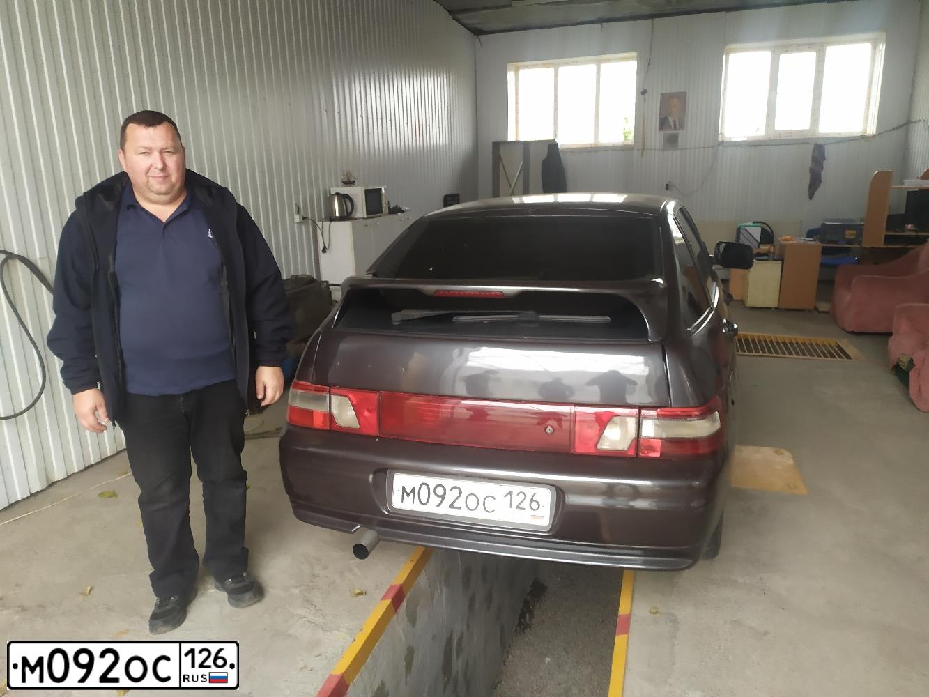 Фото автомобиля LADA 2112, 2007 — госномер Е038МТ116. Цвет: СЕРЫЙ