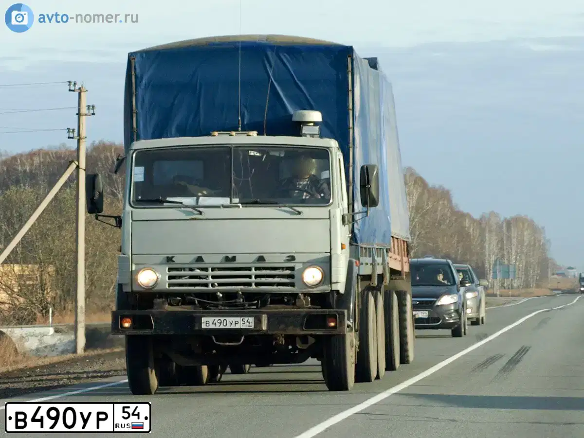 Фото автомобиля KAMAZ Z 65115 6X4, 2004 — госномер В490УР154. Цвет: ОРАНЖЕВЫЙ