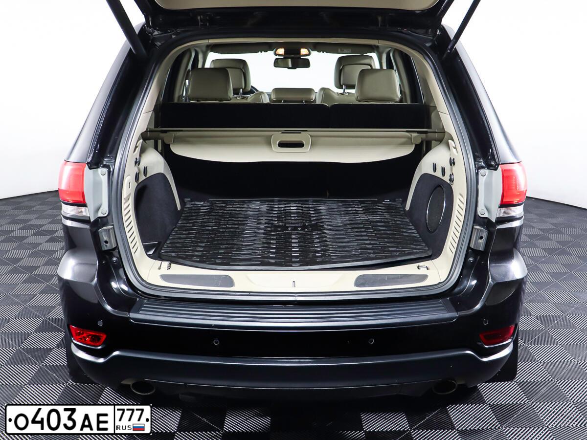 Фото автомобиля JEEP GRAND CHEROKEE, 2013 — госномер О403АЕ777. Цвет: ЧЕРНЫЙ