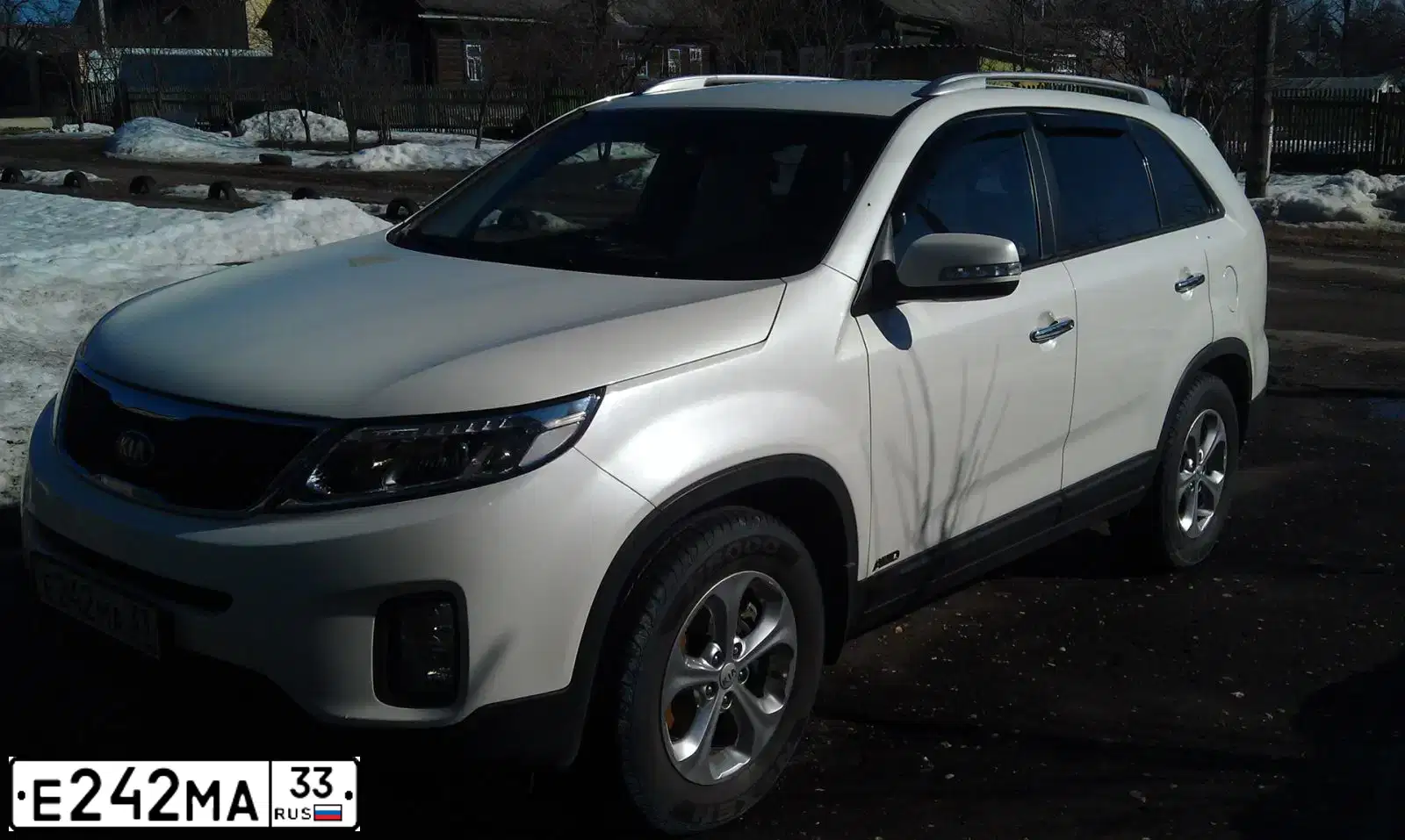 Фото автомобиля SSANGYONG KYRON, 2012 — госномер М945НЕ33. Цвет: ЧЕРНЫЙ