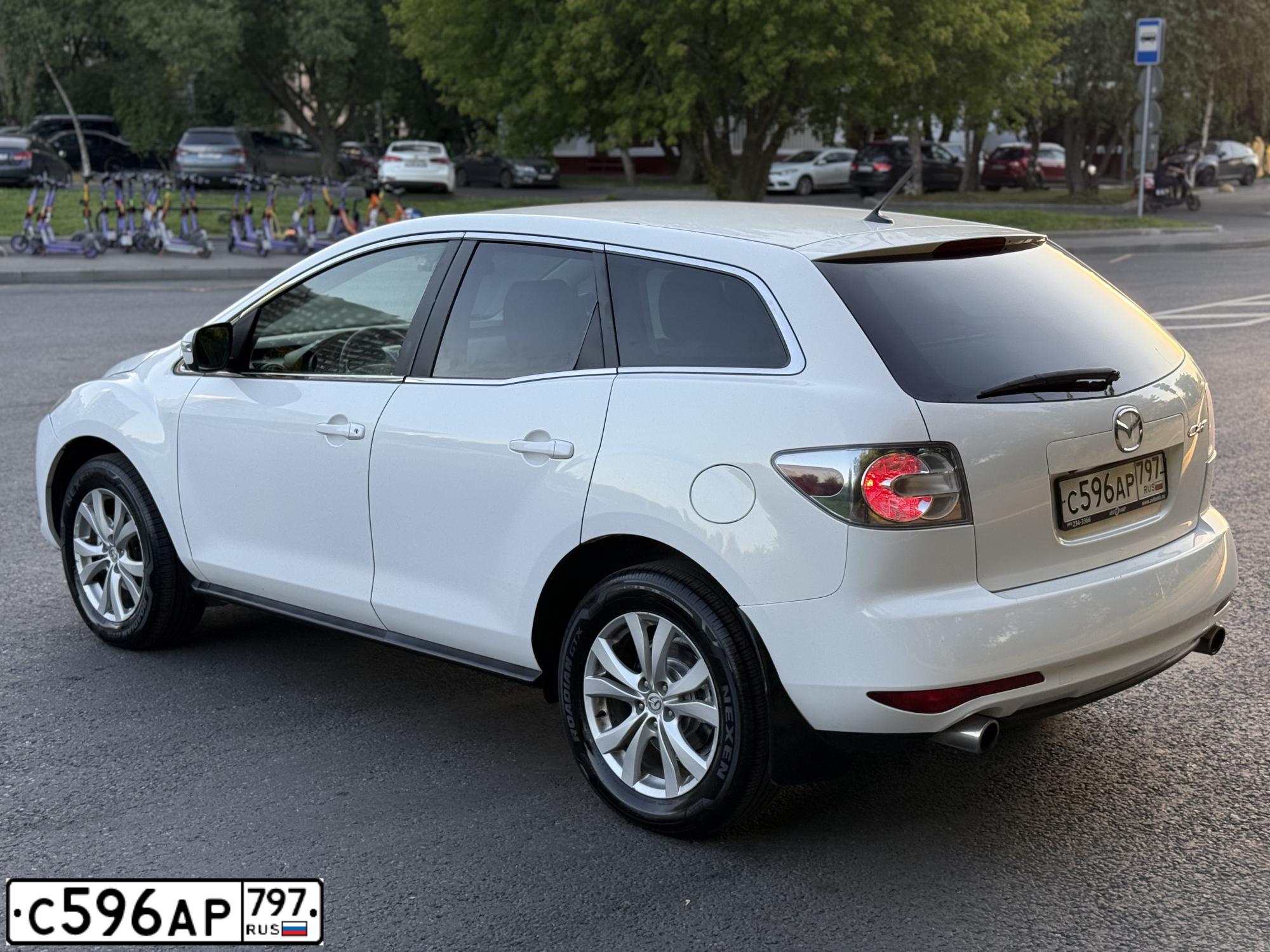Фото автомобиля MAZDA CX-7, 2010 — госномер С596АР797. Цвет: Белый