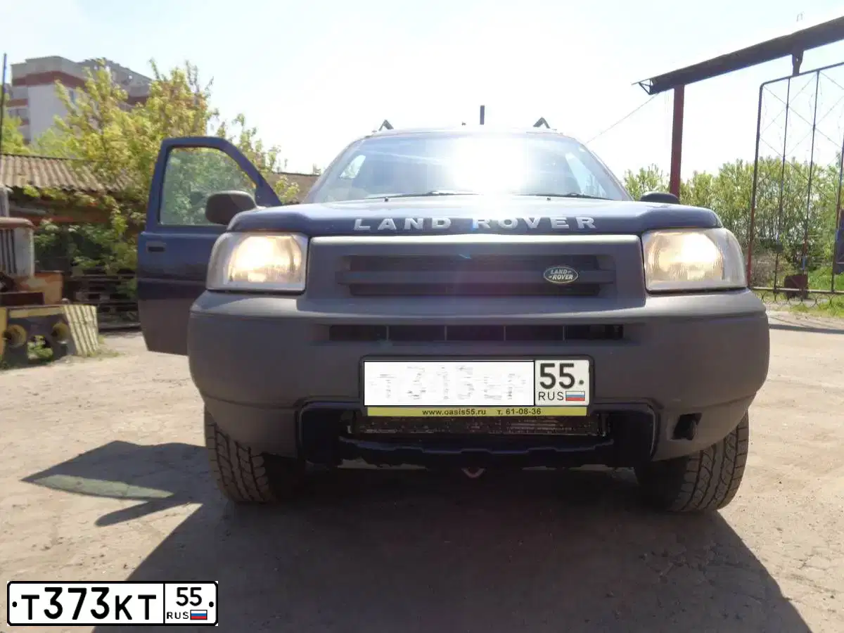 Фото автомобиля RENAULT LOGAN, 2014 — госномер Т373КТ55. Цвет: СВЕТЛО СИНИЙ