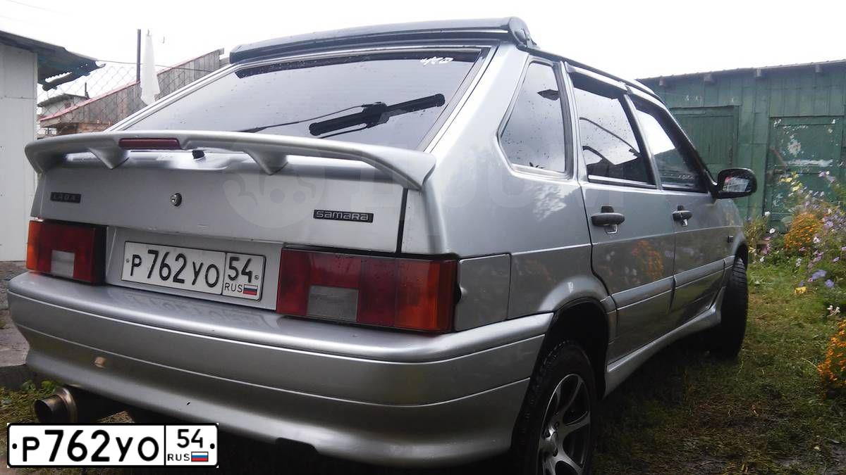 Фото автомобиля LADA 2114 SAMARA, 2006 — госномер Р762УО54. Цвет: СВЕТЛО СЕРЕБРИСТЫЙ МЕТАЛЛ