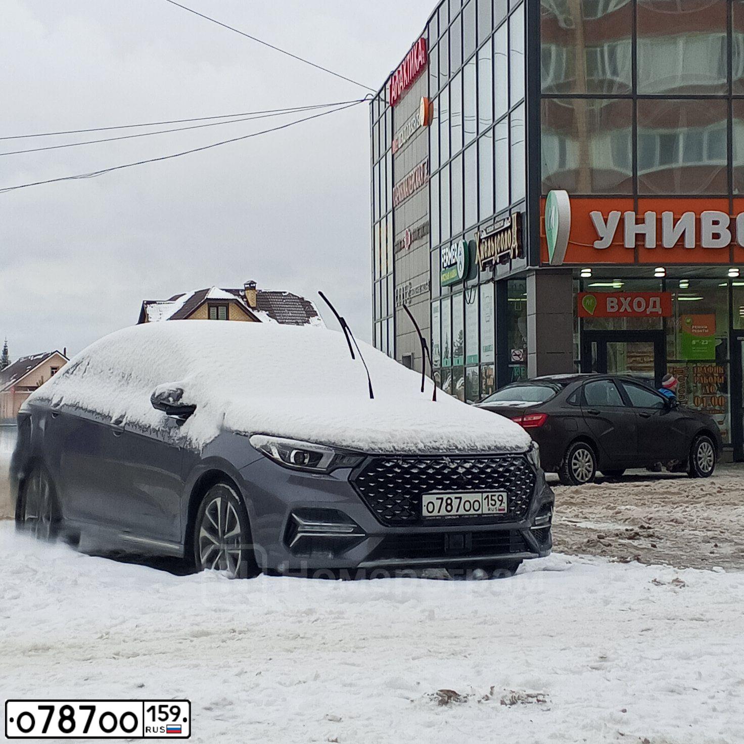 Фото автомобиля BMW X5, 2009 — госномер О001ВА21. Цвет: ЧЕРНЫЙ